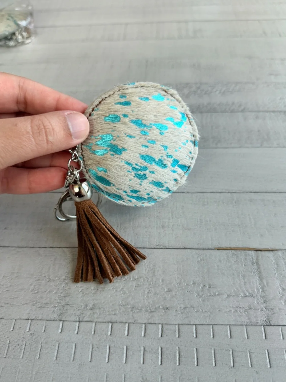 Western Acid Wash Round Turquoise & White Haircalf Keychain with Brown Tassel